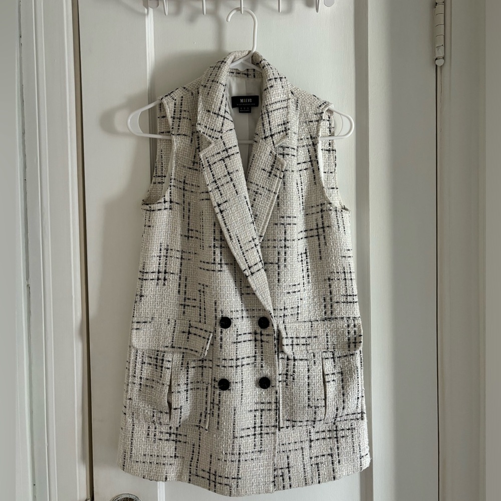 fun black and white vest from Anthropologie brand Maeve